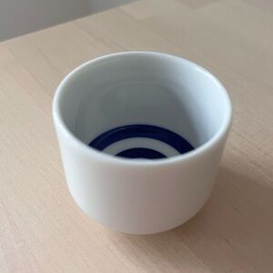 Japanese ceramic sake set in natural wood case.